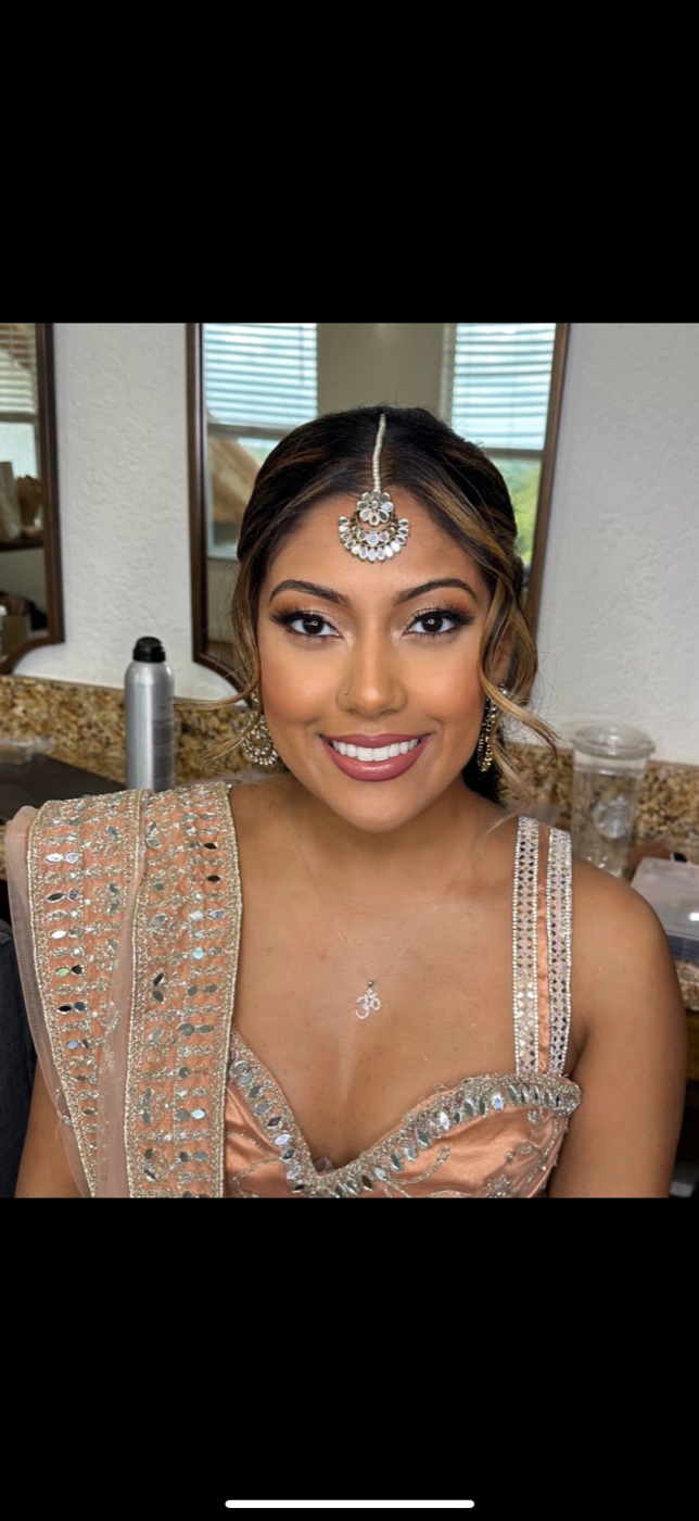 Soft glam makeup close-up, nude lip and shimmer eye